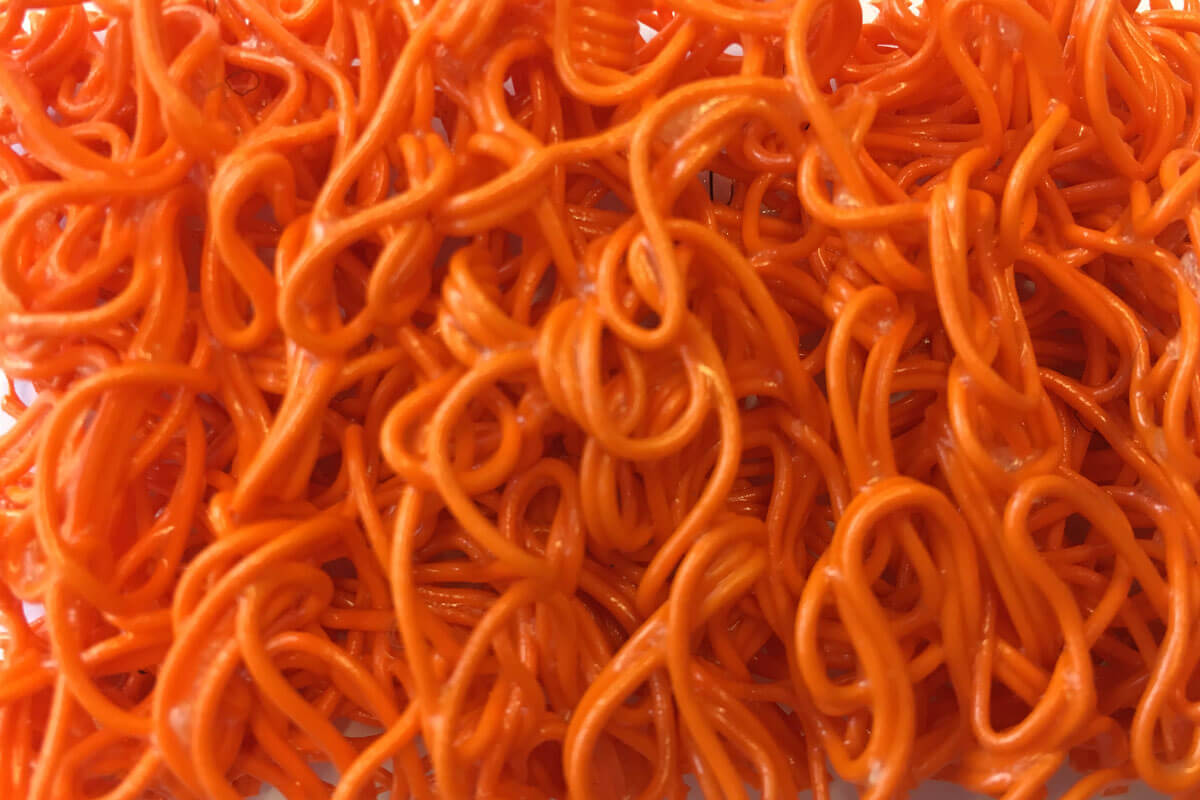 Felpudo Rizos de Vinilo Fideos de 14 mm de altura naranja en DecoStands